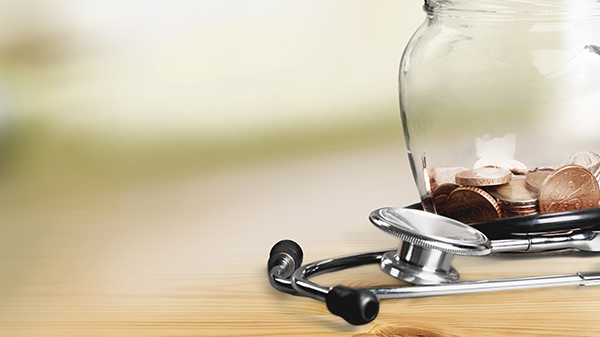 Doctor's Stethoscope and coins