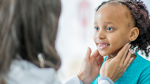 Solid Tumor Pediatric Doctor With Patient