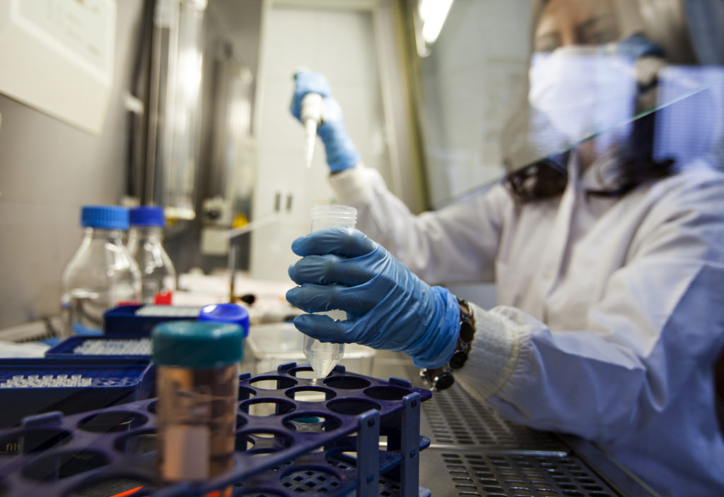 lab worker working on first-to-file study