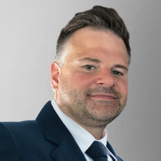 face of Richard Bennet grey background